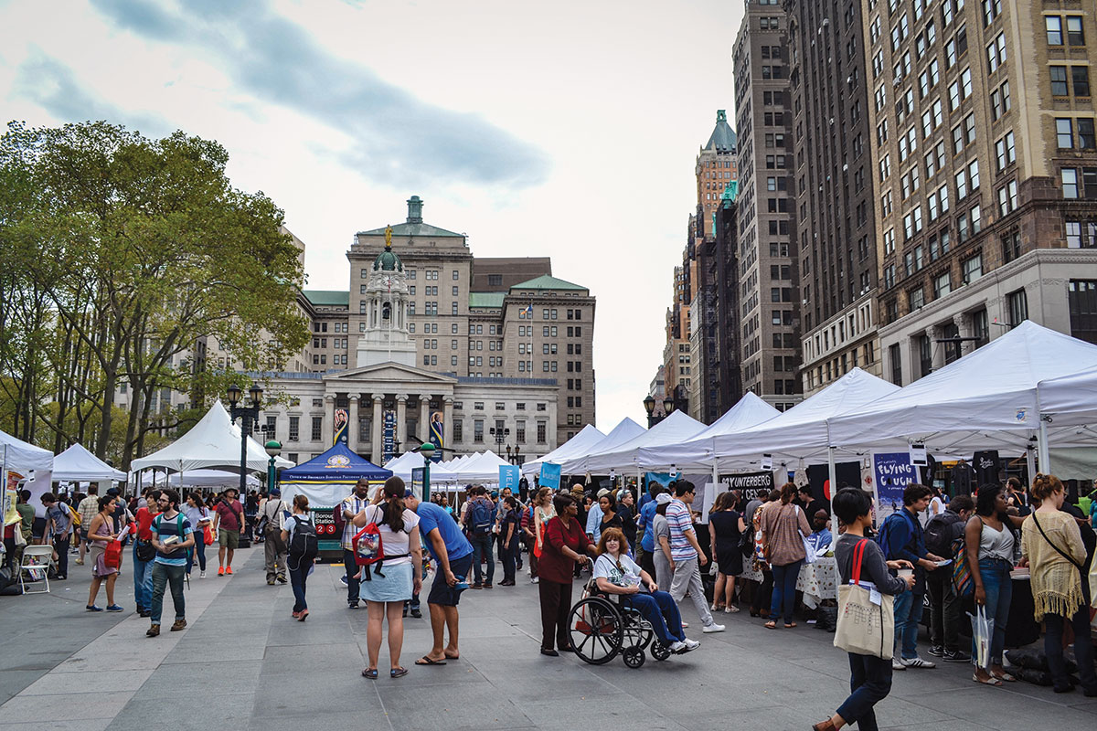 The vendor booths line up in downtown Brooklyn, right in front of Brooklyn Borough Hall.