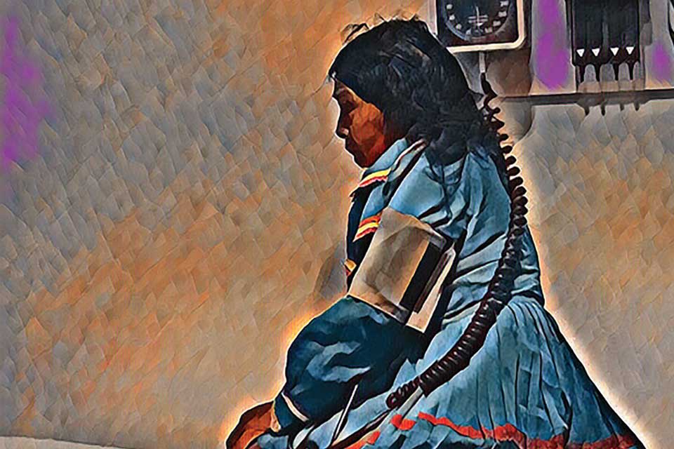 A painting of an indigenous woman in traditional dress sitting on a medical examination bed with a blood pressure cuff on her arm