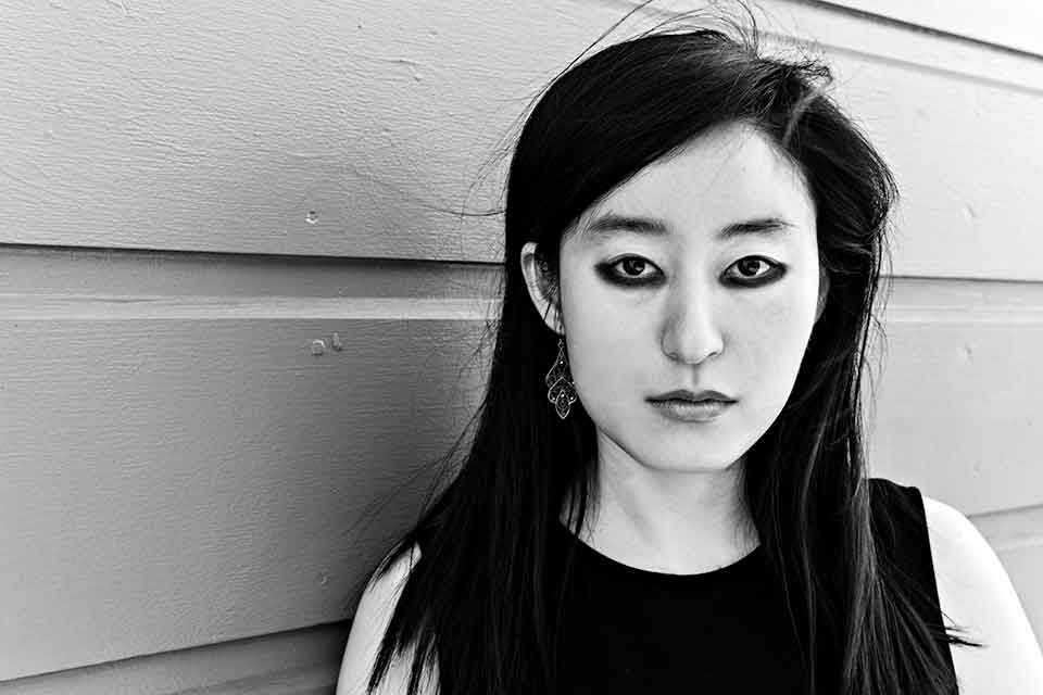 A black and white photograph of R. O. Kwon