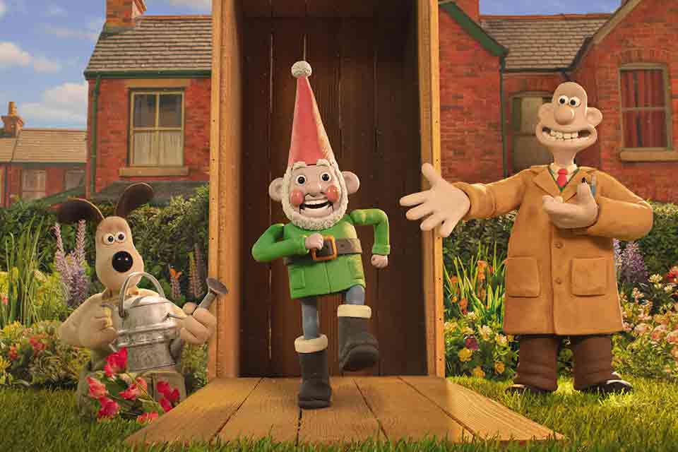 An illustration of a dog, an elf, and a bald man in an overcoat in a garden.