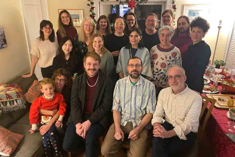 Members of the Third Coast Translators Collective at their annual holiday party in December 2024.