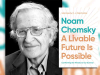 Noam Chomsky with the cover to his book A Livable Future Is Possible