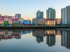 The skyline of Buenos Aires as reflected in a body of water on its edge