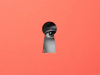 An eye, rendered in black and white, peers through a keyhole shape in a salmon colored rectangle