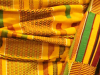 The traditional Ghanian kente cloth that Meshack Asare wore to the 2015 Neustadt Festival ceremony.