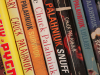 Chuck Palahniuk books on a shelf