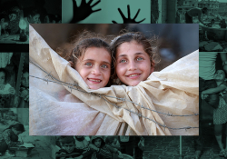 Photo by Fadi Thabet of two young Palestinian girls looking over a tent surrounded by barbed wire
