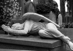 A winged figure reclining