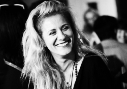 A black and white photograph of Fitore Berisha Alísdоttir