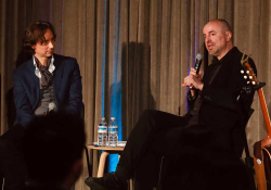 Patricio Ferrari and Nikola Madžirov conversing on a stage