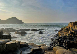 Waves crash on a rocky shore
