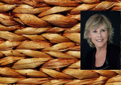 A close-up of stitched textiles with a photo of Helene Dorion inset