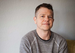 A photograph of Ari Larissa Heinrich